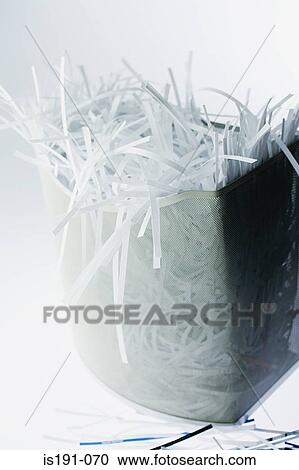 Shredded paper spilling out of bin View Large Photo Image Stock Image - Shredded paper spilling out of bin. Fotosearch