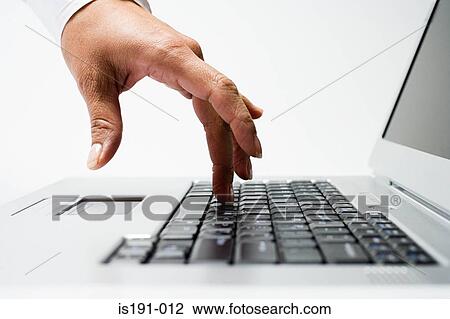 Typing on a laptop View Large Photo Image Stock Image - Typing on a laptop. Fotosearch