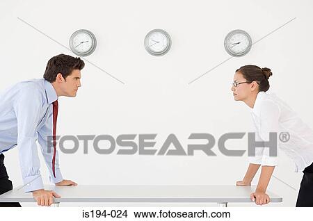 Businessman and businesswoman in an argument View Large Photo Image Picture - Businessman and businesswoman in an argument. Fotosearch