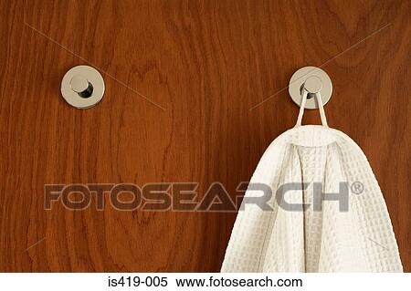 Bathrobe on a coat hook View Large Photo Image Stock Photography - Bathrobe on a coat hook. Fotosearch