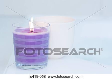 Candles on the edge of a bath View Large Photo Image Stock Photo - Candles on the edge of a bath. Fotosearch