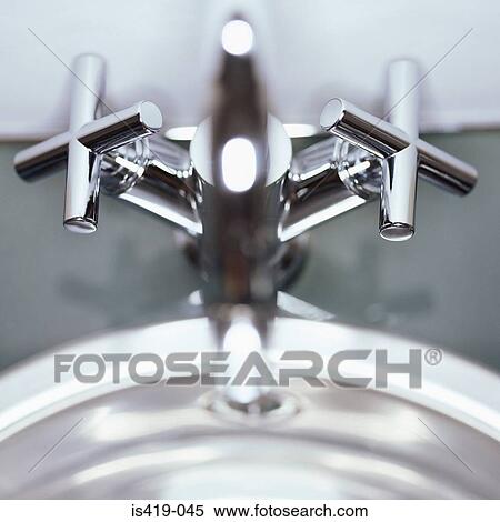 Stock Photography - Chrome taps. Fotosearch