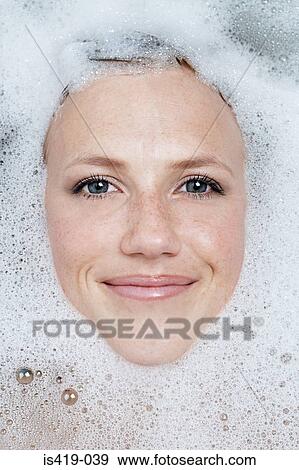 Face of woman in the bath View Large Photo Image Stock Photo - Face of woman in the bath. Fotosearch