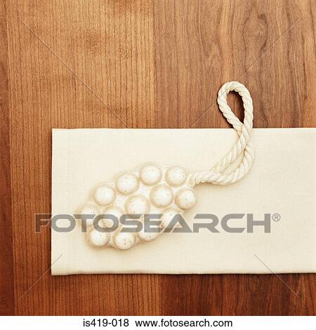 Stock Photo - Massage soap on a cloth. Fotosearch