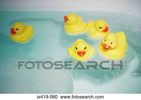 Stock Image - Rubber ducks in the bath. Fotosearch