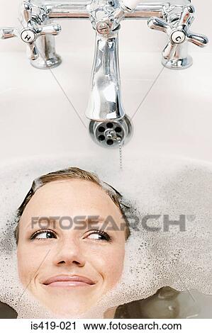 Woman having a bath View Large Photo Image Stock Image - Woman having a bath. Fotosearch
