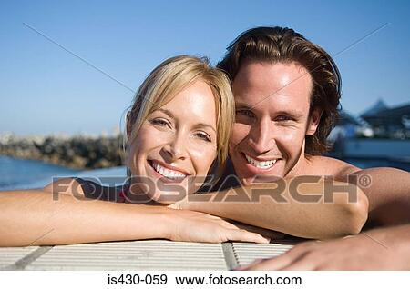 Happy couple on holiday View Large Photo Image Stock Photo - Happy couple on holiday. Fotosearch