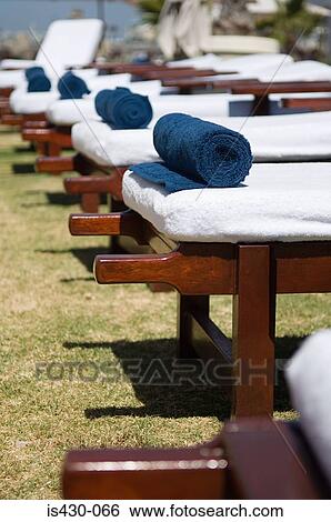 Sunbeds with towels View Large Photo Image Stock Photograph - Sunbeds with towels. Fotosearch