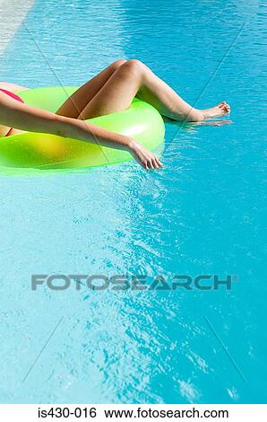 Woman in pool View Large Photo Image Stock Photograph - Woman in pool. Fotosearch