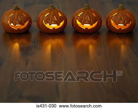 Row of pumpkin ornaments View Large Photo Image Stock Image - Row of pumpkin ornaments. Fotosearch