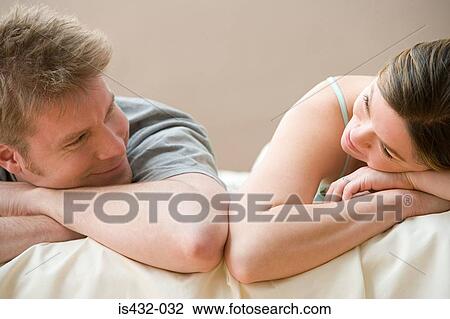 Couple looking at each other View Large Photo Image Stock Image - Couple looking at each other. Fotosearch
