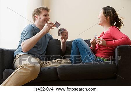 Couple playing cards View Large Photo Image Picture - Couple playing cards. Fotosearch