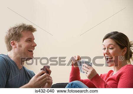 Couple playing cards View Large Photo Image Stock Image - Couple playing cards. Fotosearch