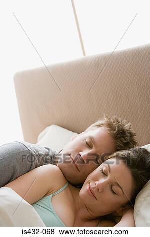 Couple sleeping View Large Photo Image Stock Photo - Couple sleeping. Fotosearch
