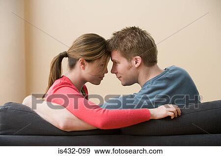 Couple touching foreheads View Large Photo Image Stock Photo - Couple touching foreheads. Fotosearch