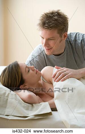 Couple waking up View Large Photo Image Picture - Couple waking up. Fotosearch