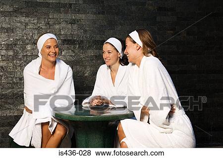 Stock Photo - Friends at the spa. Fotosearch