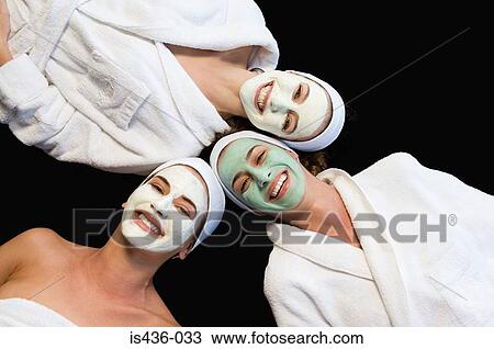 Friends wearing facial masks View Large Photo Image Stock Image - Friends wearing facial masks. Fotosearch