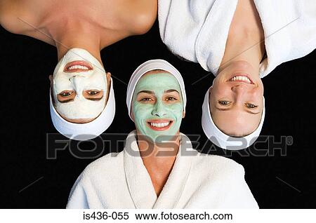 Friends wearing facial masks View Large Photo Image Stock Photography - Friends wearing facial masks. Fotosearch