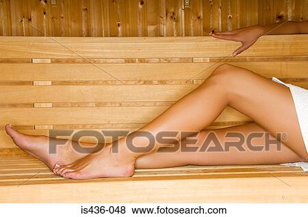 Legs of woman in a sauna View Large Photo Image Stock Photo - Legs of woman in a sauna. Fotosearch