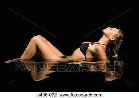 Sexy woman in water View Large Photo Image Stock Image - Sexy woman in water. Fotosearch