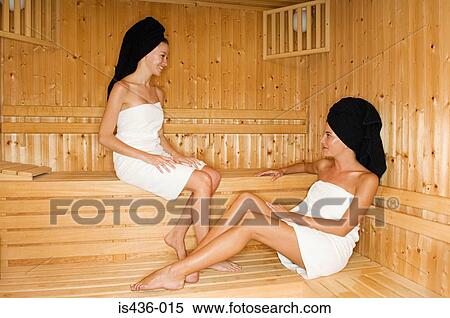 Stock Photography - Two women in sauna. Fotosearch