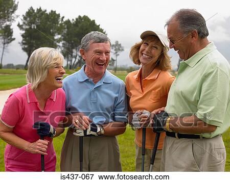 Golfers laughing View Large Photo Image Stock Photo - Golfers laughing . Fotosearch