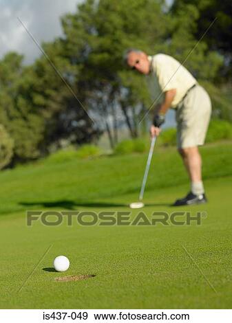 Man playing golf View Large Photo Image Stock Photo - Man playing golf. Fotosearch