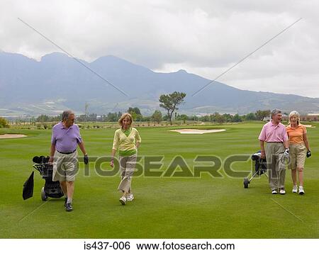 Senior couples on golf course View Large Photo Image Stock Photograph - Senior couples on golf course. Fotosearch