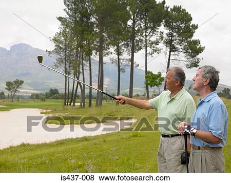 Senior men on a golf course View Large Photo Image Stock Photo - Senior men on a golf course. Fotosearch