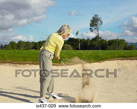 Woman playing golf View Large Photo Image Stock Photo - Woman playing golf. Fotosearch
