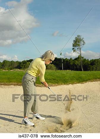 Woman playing golf View Large Photo Image Stock Photo - Woman playing golf. Fotosearch
