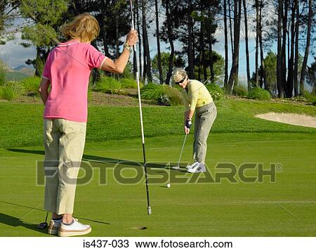 Women playing golf View Large Photo Image Stock Image - Women playing golf. Fotosearch