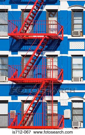 Apartment building with fire escapes View Large Photo Image Stock Photo - Apartment building with fire escapes. Fotosearch