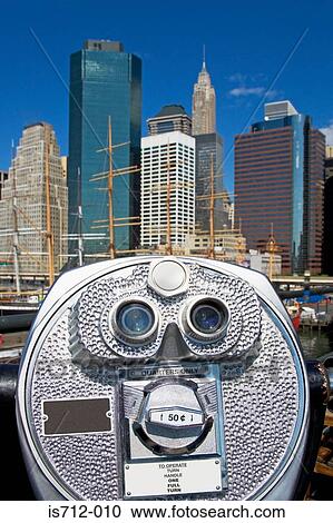 Binoculars looking at new york skyline View Large Photo Image Stock Image - Binoculars looking at new york skyline. Fotosearch