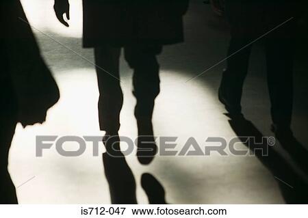 Stock Photo - Commuters in silhouette. Fotosearch