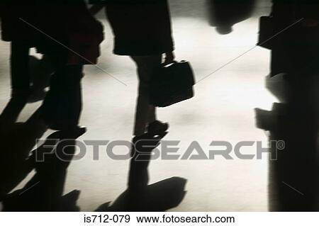 Commuters in silhouette View Large Photo Image Stock Photo - Commuters in silhouette. Fotosearch