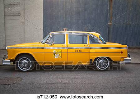 Stock Image - Parked yellow taxi cab new york. Fotosearch