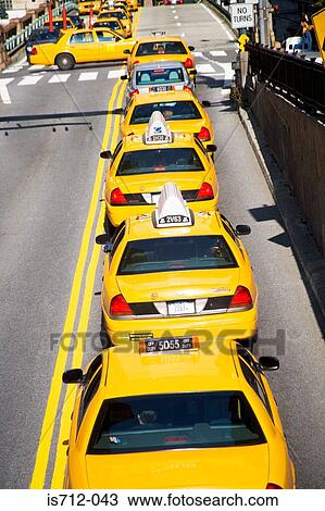 Queue of yellow taxi cabs new york View Large Photo Image Stock Image - Queue of yellow taxi cabs new york. Fotosearch