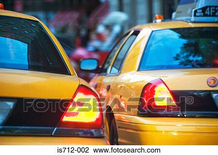 Stock Image - Yellow taxi cabs in new york. Fotosearch