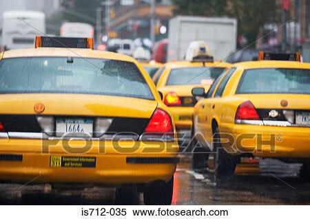Stock Photography - Yellow taxi cabs new york. Fotosearch