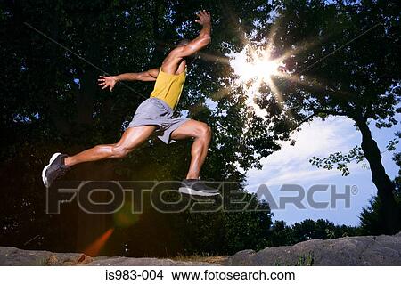 Athlete in the park View Large Photo Image Picture - Athlete in the park. Fotosearch