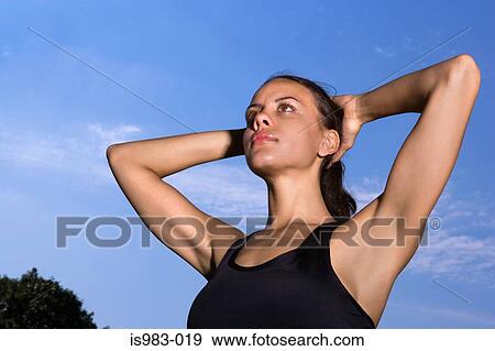 Female athlete stretching View Large Photo Image Stock Photo - Female athlete stretching. Fotosearch