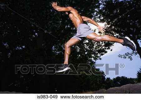 Man leaping View Large Photo Image Stock Photo - Man leaping. Fotosearch