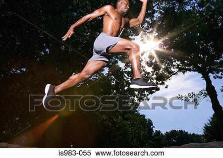 Man leaping View Large Photo Image Stock Photography - Man leaping. Fotosearch