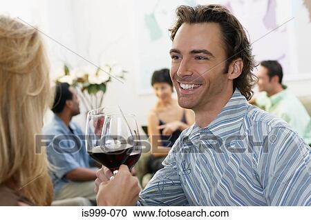 Couple at a party View Large Photo Image Stock Image - Couple at a party. Fotosearch