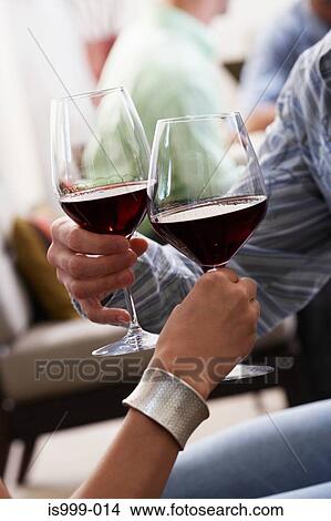 Picture - Couple having red wine. Fotosearch