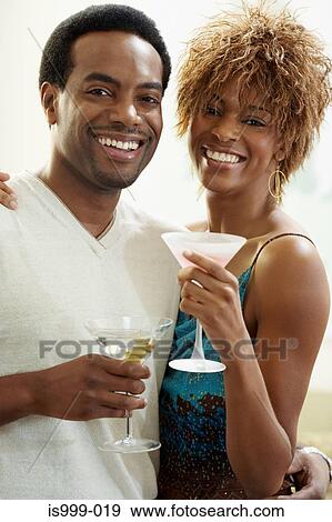 Couple with cocktails View Large Photo Image Stock Photo - Couple with cocktails. Fotosearch