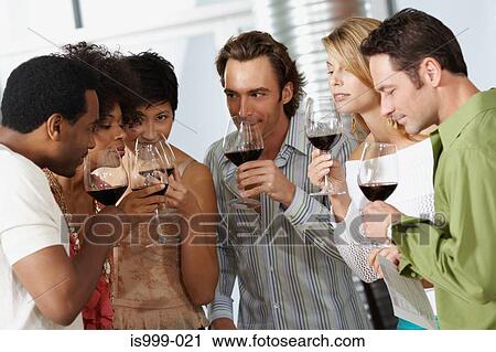 Friends appreciating wine View Large Photo Image Stock Image - Friends appreciating wine. Fotosearch