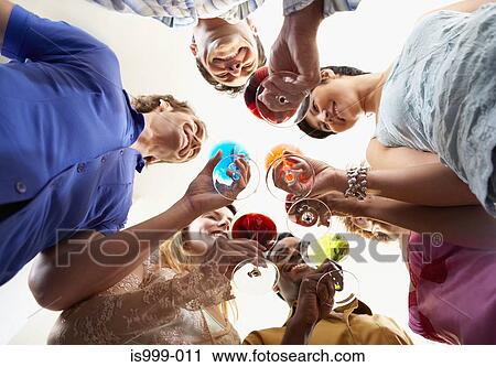 Friends having a variety of drinks View Large Photo Image Stock Image - Friends having a variety of drinks. Fotosearch